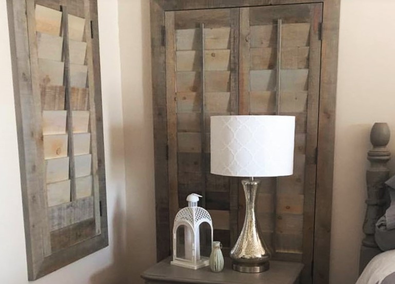 Denver bedroom with repurposed wood shutters.